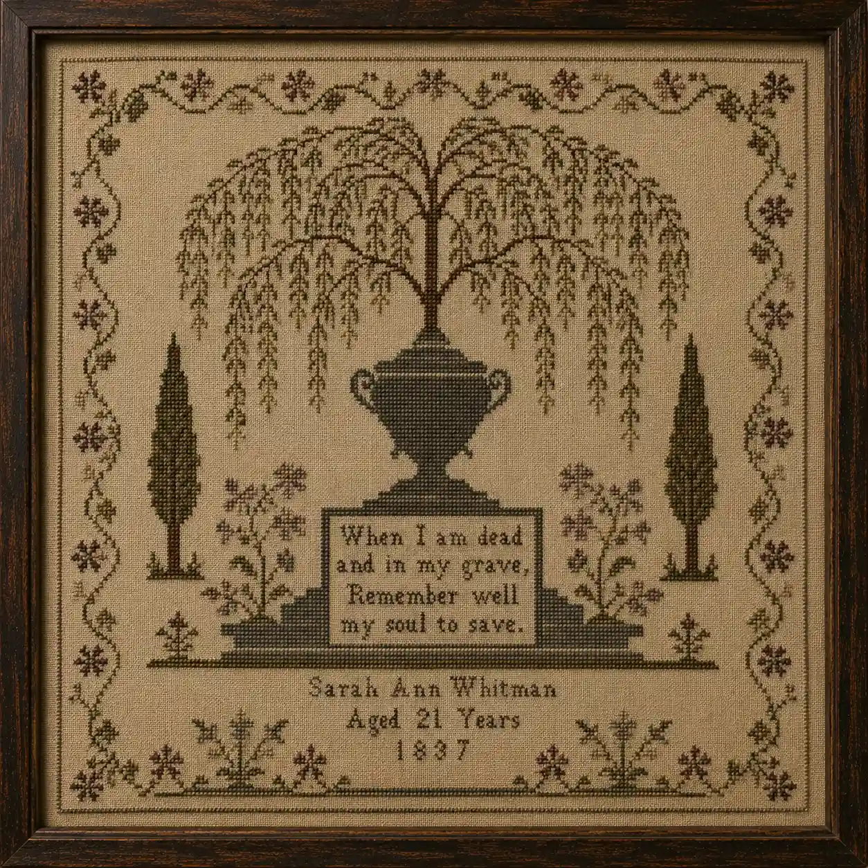 A muted-palette sampler with a willow tree and urn memorial motif